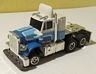 AFX slotless Speed Steer Peterbilt cab in white with blue and light blue