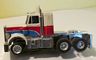 AFX Peterbilt tractor HO slotcar in white, red, and blue