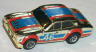 AFX slot car Ford Escort, gold chrome with blue and red #46