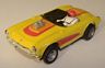AFX '57 Corvette convertible, yellow with red and orange, no glass or roll bar.