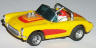 AFX '57 Corvette convertible, yellow with red and orange.