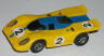 AFX Porsche 917 lighted slot car, yellow with blue #2 closed scoop.