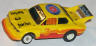 AFX BMW 320i, yellow with red and orange #3 'turbo'