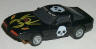 Tomy Ghost Racer Corvette, black with white skull and yellow spider.